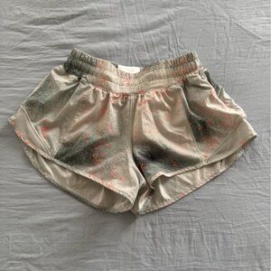 lululemon hotty hot 2.5 low rise glow in the dark shorts green, orange, cream